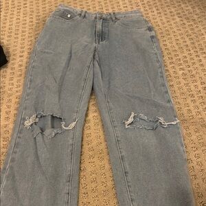 Women's Light Blue Distressed Jeans
